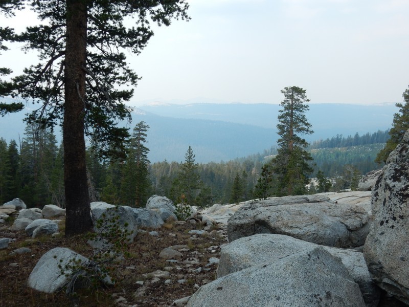 Dogtooth Peak and Three Sisters barely visible from ridge above Post Corral Meadow